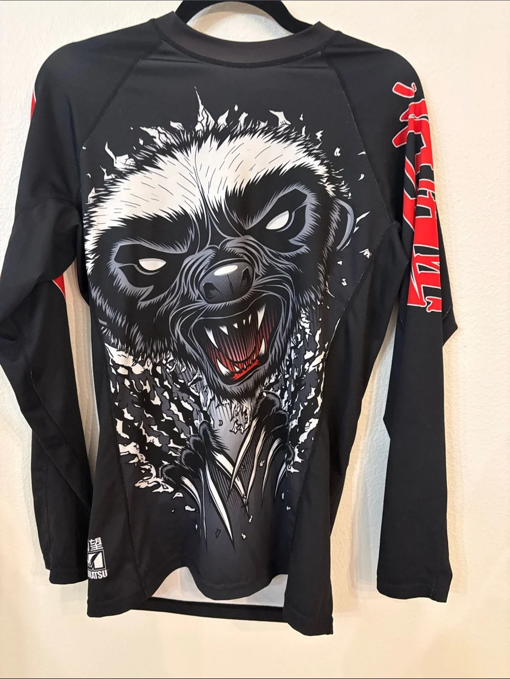 Tatami Fightware x Meerkatsu Original artwork black rash guard w/ animal graphic